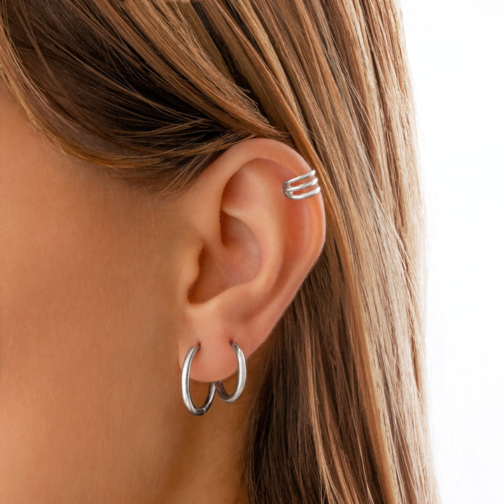 Timeless sterling silver hoop earrings for women. Elegant, classic hoops for everyday style & versatile accessorizing.