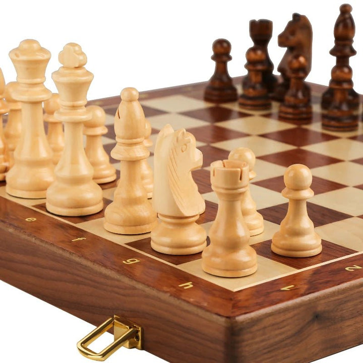 Foldable walnut chess board closed, showcasing the beautiful wood grain of this portable wooden strategy game.