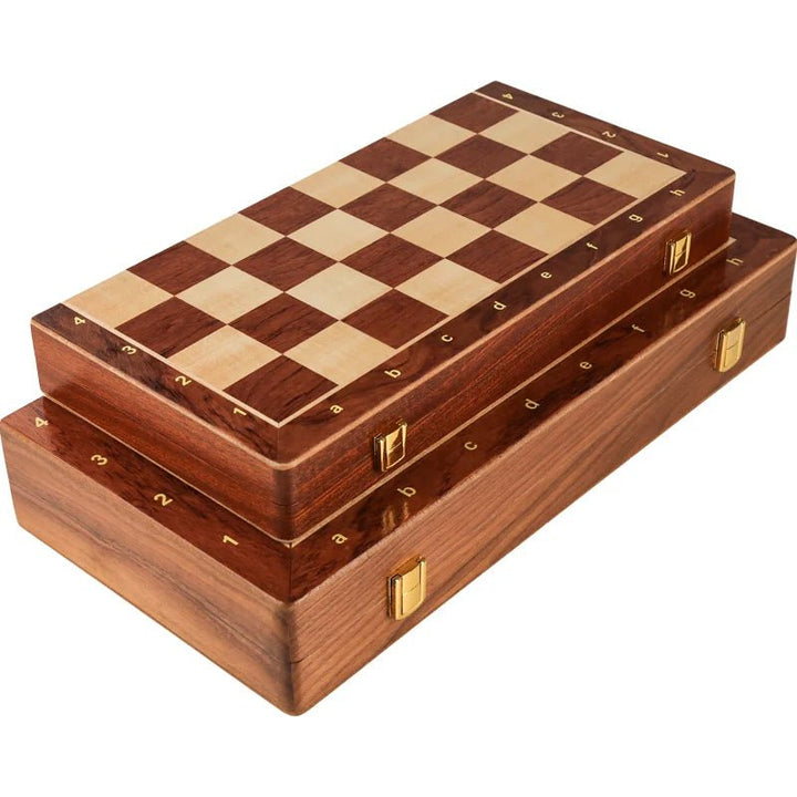 Hand-carved wooden chess pieces, including king & queen, displayed on the premium foldable walnut chess board.
