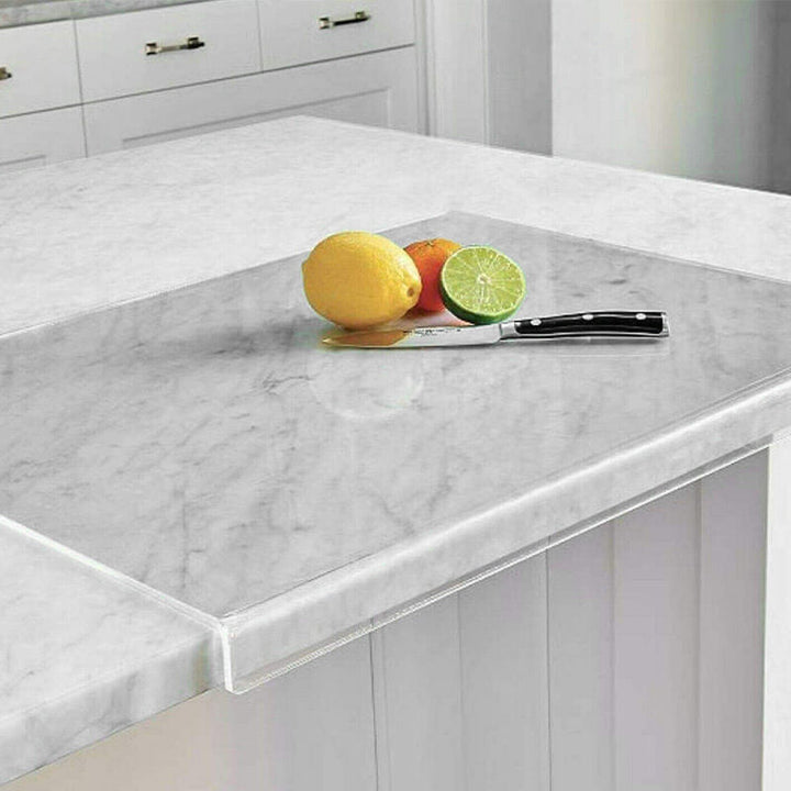 Clear acrylic non-slip cutting board for safe food prep; modern kitchen tool for hygiene.