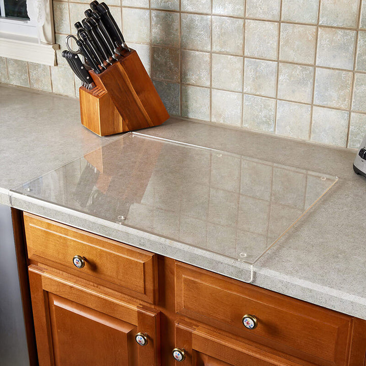 Non-slip clear acrylic kitchen board; durable & essential tool for efficient food preparation.