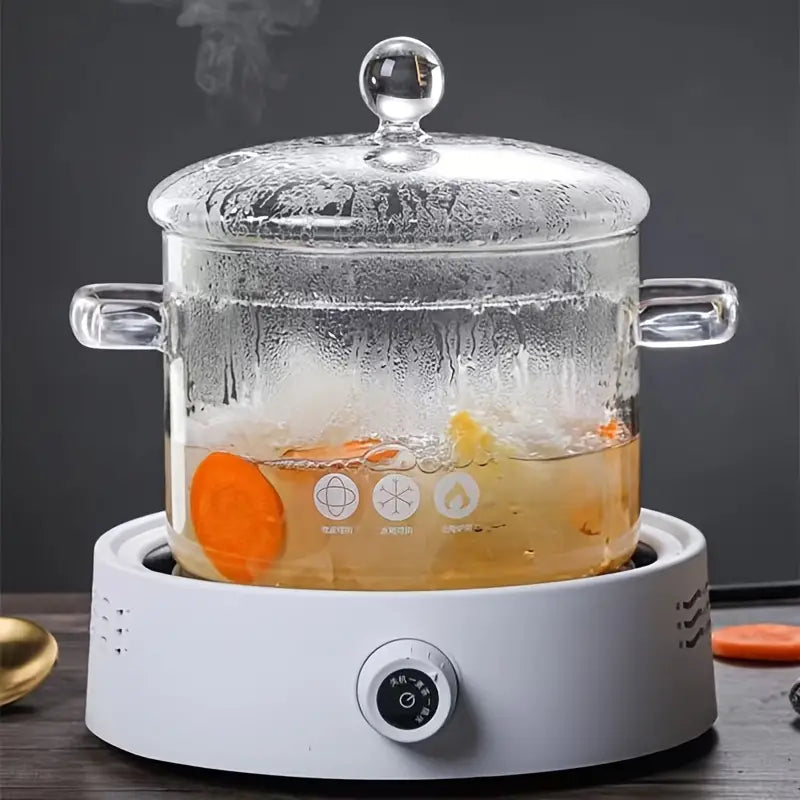 Clear glass cooking pot with lid, perfect for watching stews and soups simmer on the stovetop.