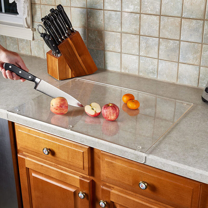 Modern GlassEdge non-slip acrylic cutting board, clear for hygienic food prep and kitchen safety.