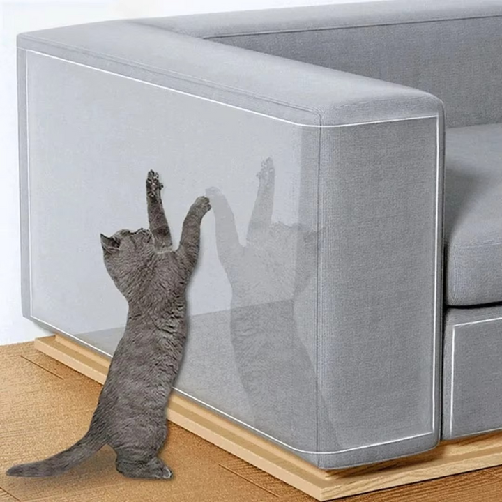 Clear self-adhesive cat scratch shield protecting a sofa's upholstery from pet damage.