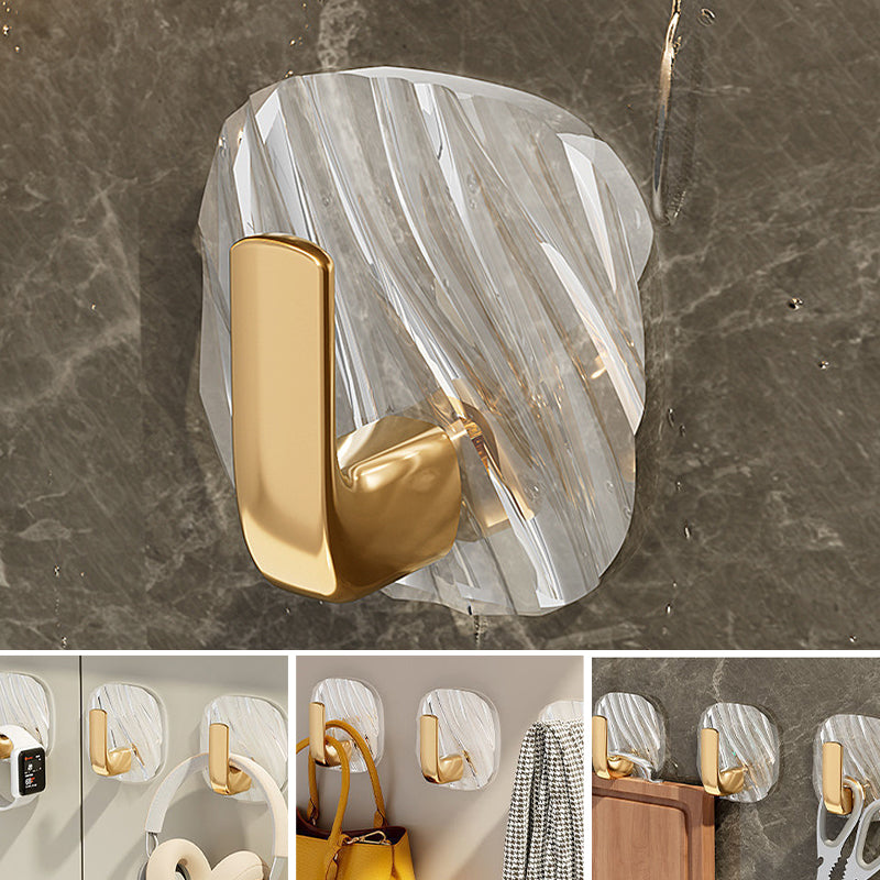 Utility hook made of clear acrylic, perfect for hanging towels or utensils without damaging walls, self-adhesive