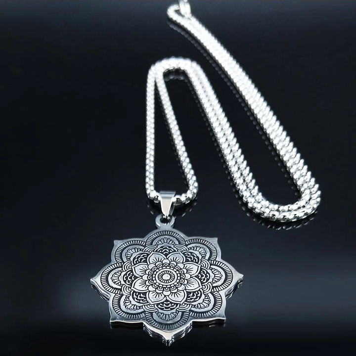 Elegant women's sterling silver lotus blossom necklace worn on a model, highlighting its spiritual and beautiful design.