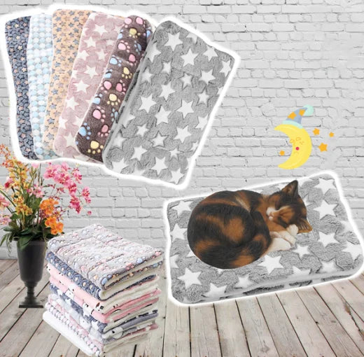 Close-up of a SnuggleSoft warming cat blanket made of ultra-soft flannel, perfect for feline comfort & naps.