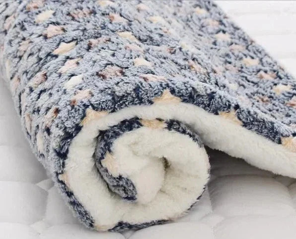 SnuggleSoft ultra-soft warming pet blanket for cats. Cozy flannel provides stress relief & comfort for feline friends.