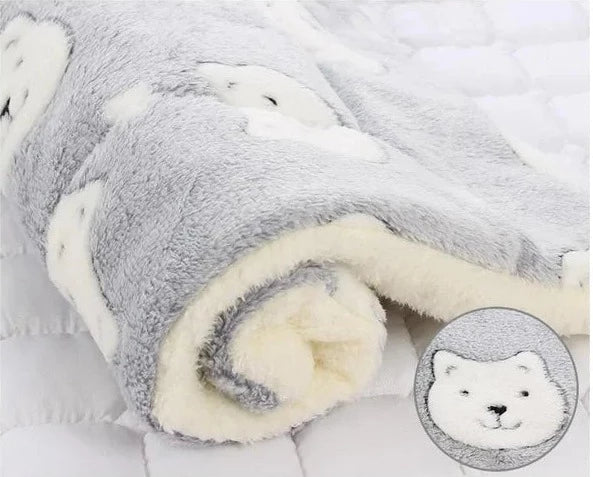 Cozy SnuggleSoft cat blanket, an ultra-soft warming flannel pet supply for stress relief & comfortable feline naps.