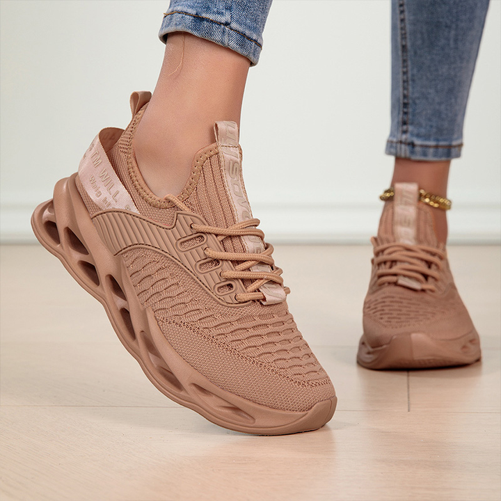 Top-down view of women's lace-up activewear sneakers, highlighting their sleek design for daily use.