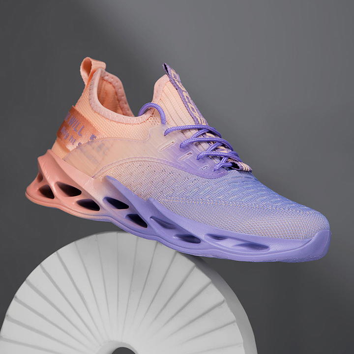 Front view of women's grey running shoes, offering superior comfort and flexibility for walking & exercise.