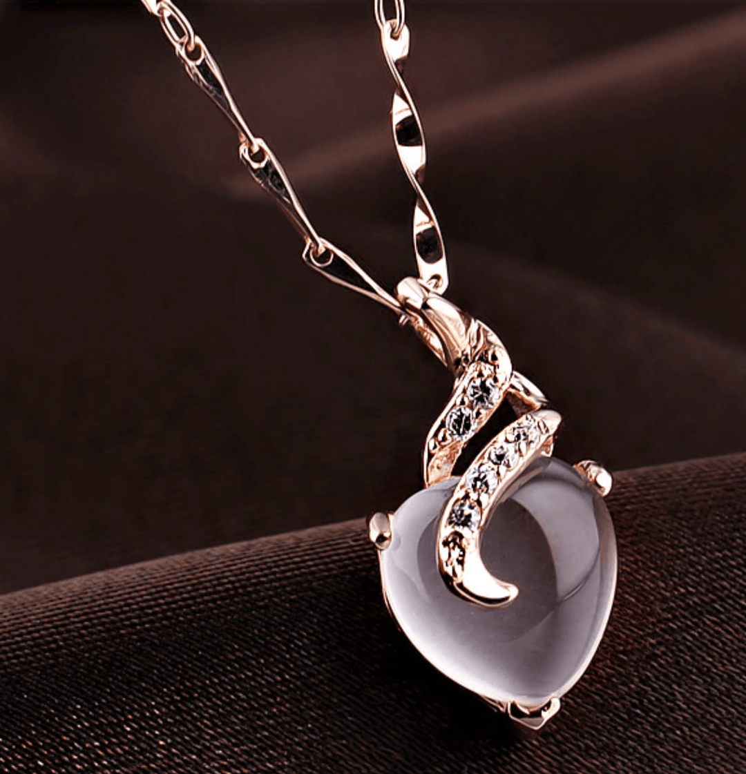 Women's Calista opal heart necklace, a timeless piece of elegant heart jewelry in rose gold.