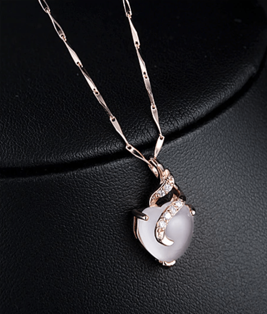 Women's elegant opal heart necklace, Calista collection, stunning opal gemstone for a sophisticated look.