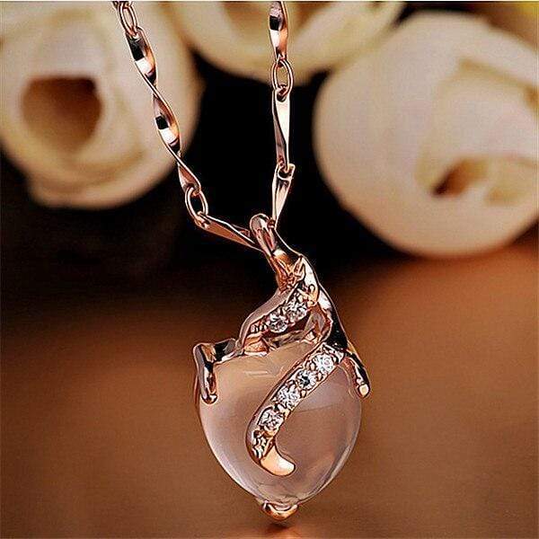 Women's elegant Calista opal heart necklace with a vibrant opal gemstone, a stunning piece of heart jewelry.