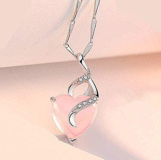 Elegant Calista women's rose gold opal heart necklace, a beautiful and symbolic heart jewelry gift for her.