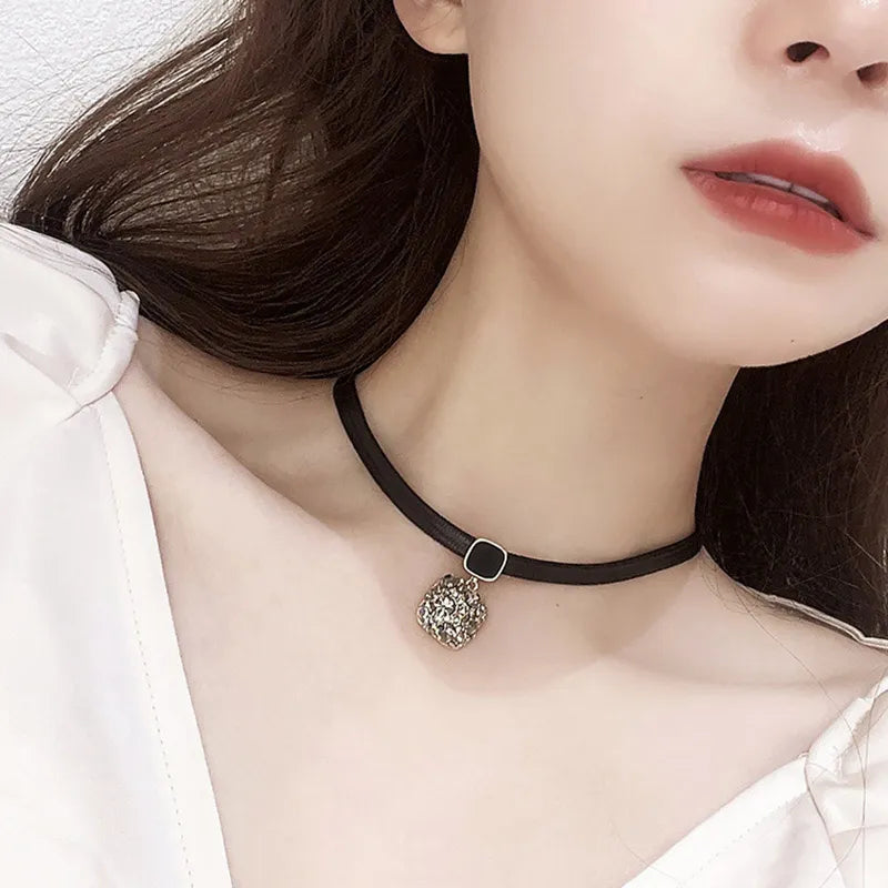 Sparkling women's geometric crystal necklace, a statement jewelry piece designed for elegance and style.