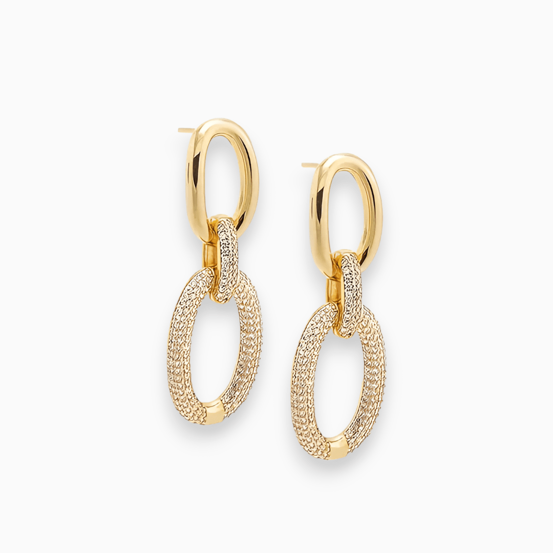 Close-up of Luxe Sparkle Aurora women's stud earrings, featuring sparkling gold-plated design, perfect fashion accessory