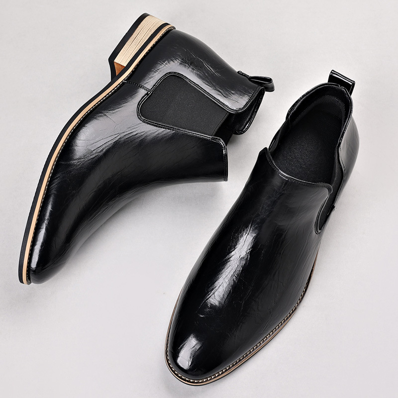 Front view of men's sophisticated slip-on dress boots, offering timeless everyday style.