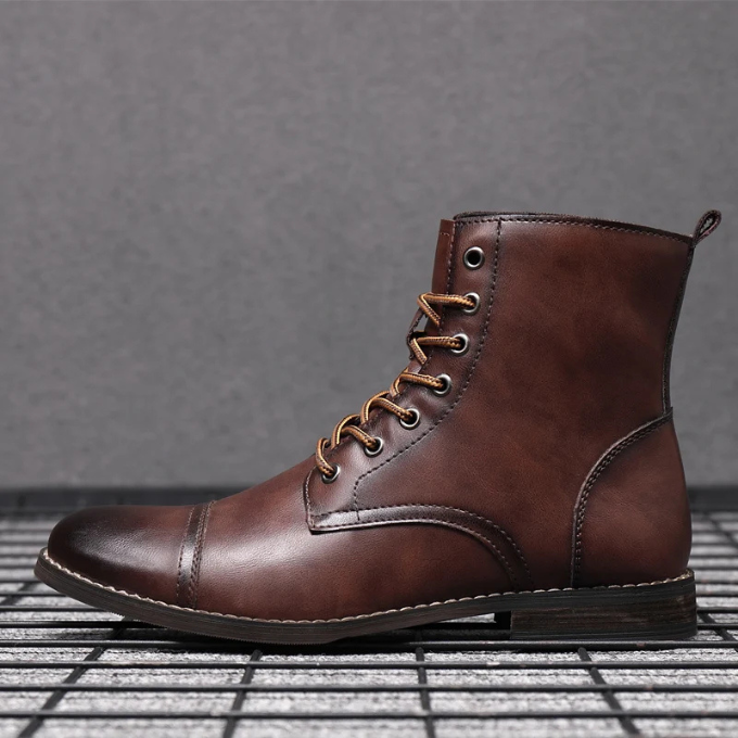 Full shot of durable men's vintage leather ankle boots, perfect for both casual and formal wear.