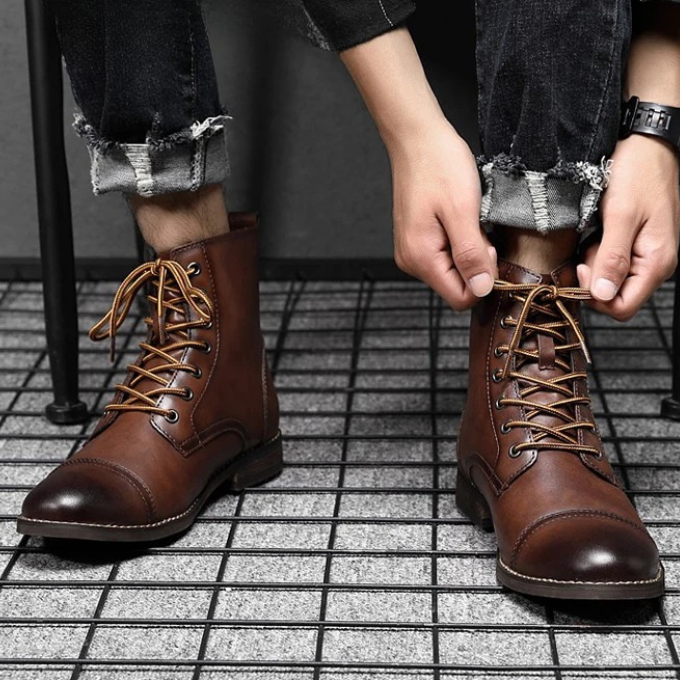 Pair of classic men's vintage leather ankle boots, offering durable comfort for everyday wear.