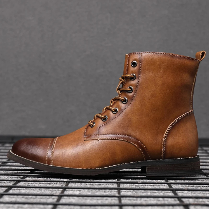 Front view of polished men's vintage leather ankle boots, a timeless addition to any wardrobe.