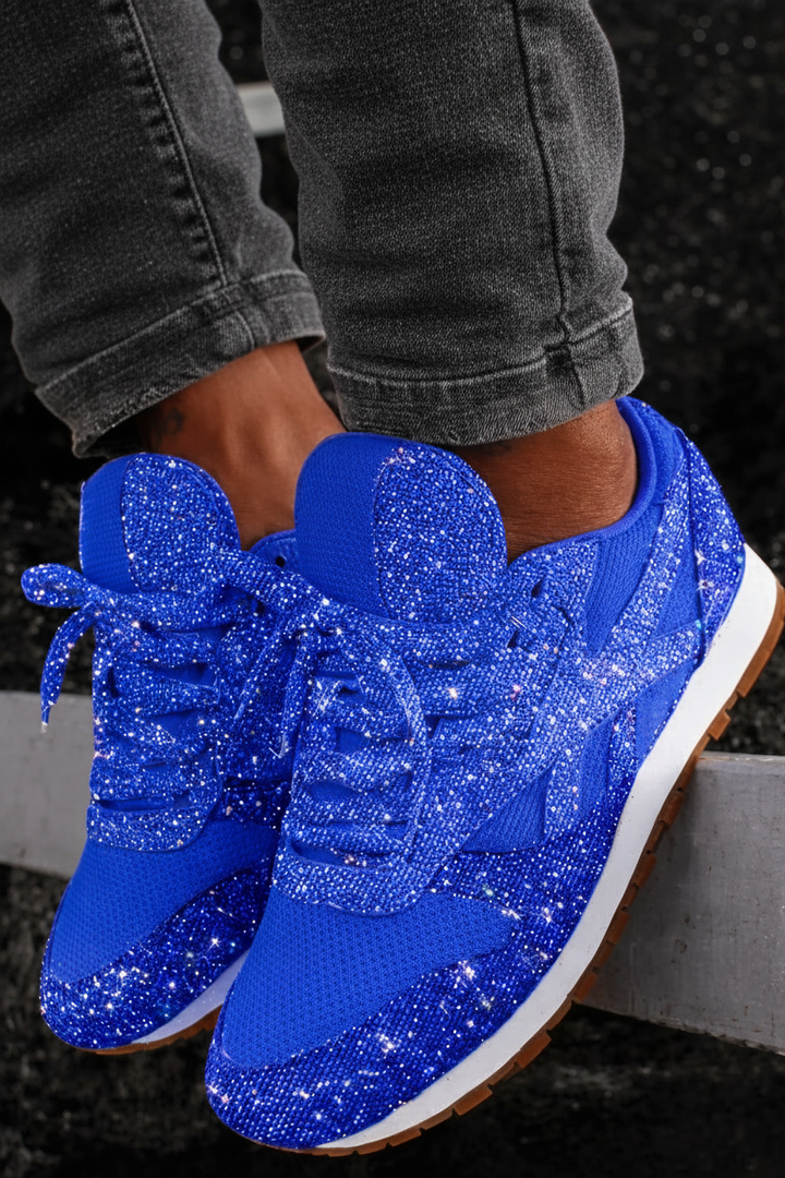 Close-up of sparkling women's glitter sneakers, perfect for trendy everyday wear and comfort.