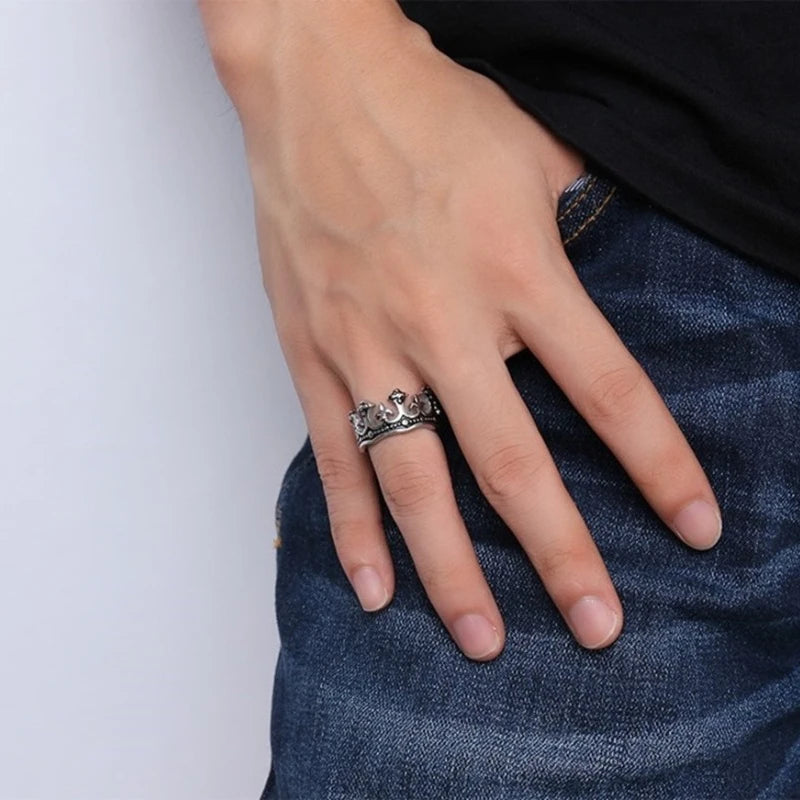Detailed shot of a unisex royal crown ring, high-quality stainless steel.