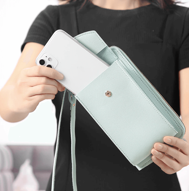 Women's compact everyday PU leather bag, adjustable strap for crossbody or shoulder use.