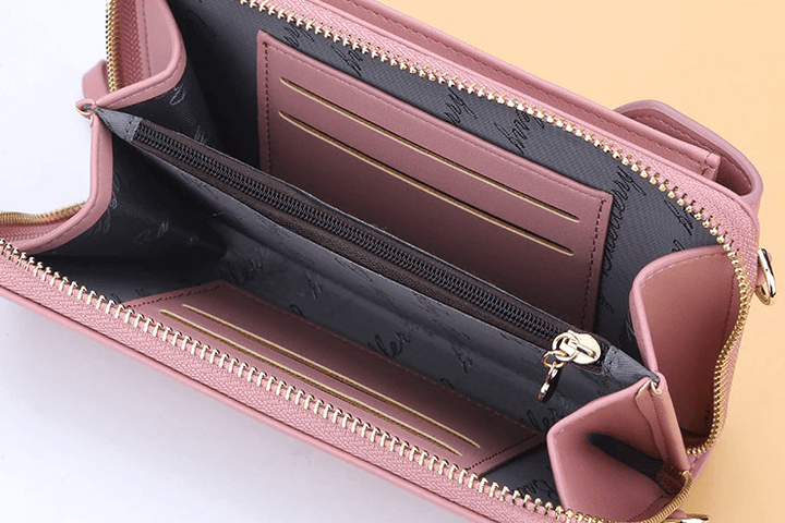 Close-up of the textured PU leather on a women's compact crossbody shoulder bag, adjustable.
