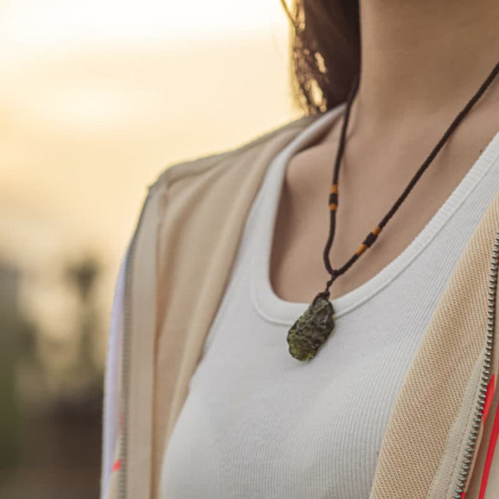 Women's spiritual Moldavite necklace, raw green crystal for energy purification & meditation aid.