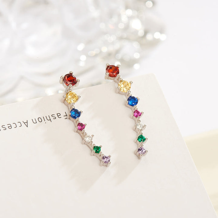 Beautiful sparkling dangle earrings, sterling silver, designed for fashion-forward women.