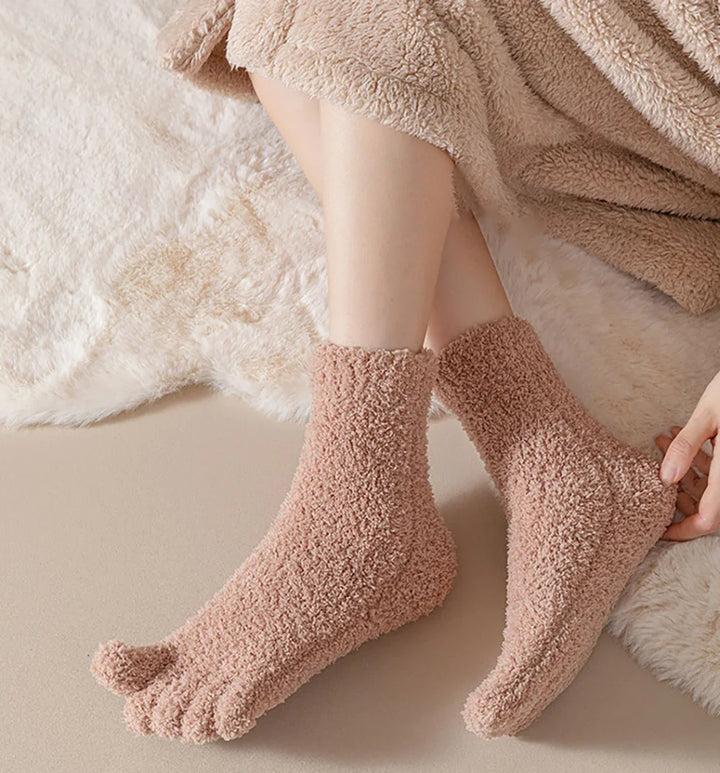 Close-up of women's ultra soft cozy toe socks, perfect for warm feet comfort.