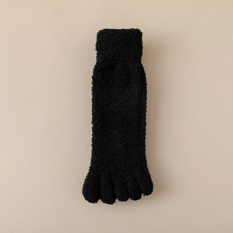 Pair of warm women's toe socks for ultimate soft comfort and loungewear relaxation.