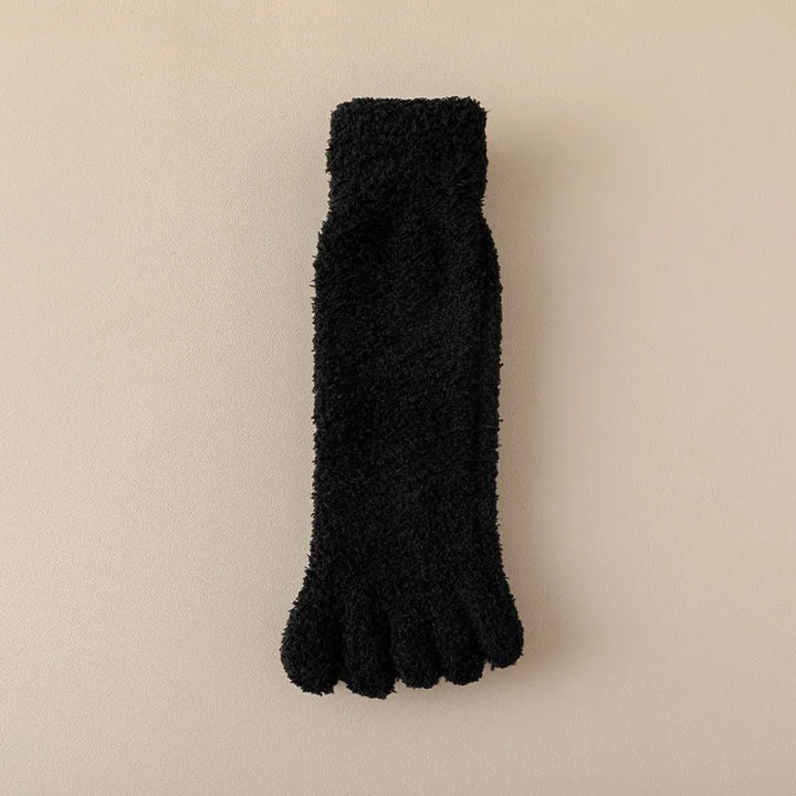 Pair of warm women's toe socks for ultimate soft comfort and loungewear relaxation.