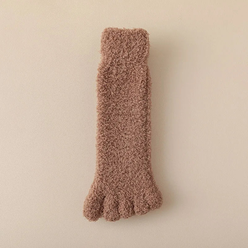 Soft knitted women's cozy toe socks, ideal for winter comfort and home wear.