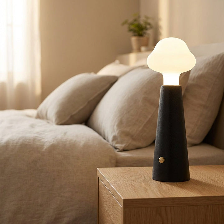 Cloud inspired LED table lamp, Nebulite, providing soft ambient lighting, perfect for bedroom decor.