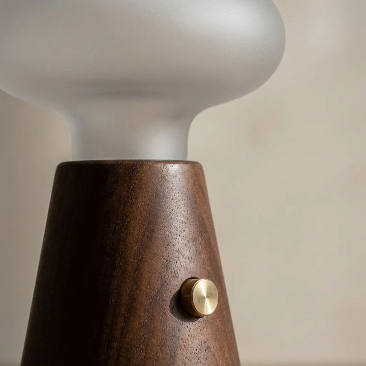 Minimalist cloud LED table lamp, Nebulite, a unique reading light for contemporary spaces.