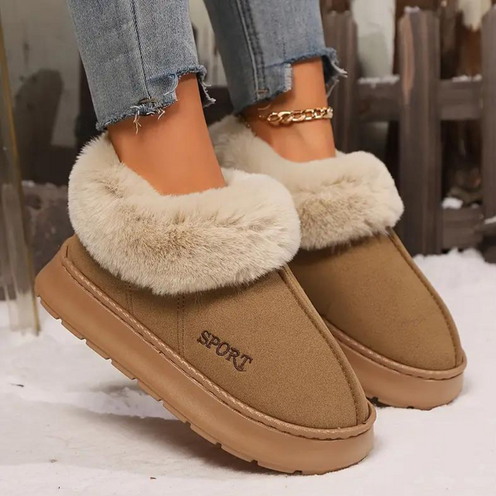 Warm women's winter slippers, cloud-soft & cozy. A perfect gift for her for ultimate indoor comfort.