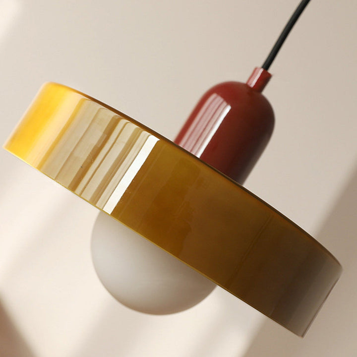 Vibrant Bauhaus inspired glass pendant, unique lighting for modern interior design.