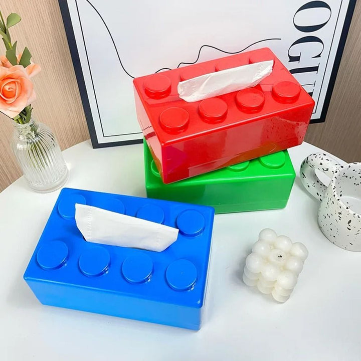 Decorative colorful block style plastic tissue cover, bringing retro charm to home decor.