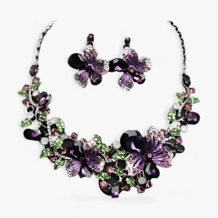 Matching floral enamel flower earrings and necklace, a colorful and unique bridal jewelry set for women.