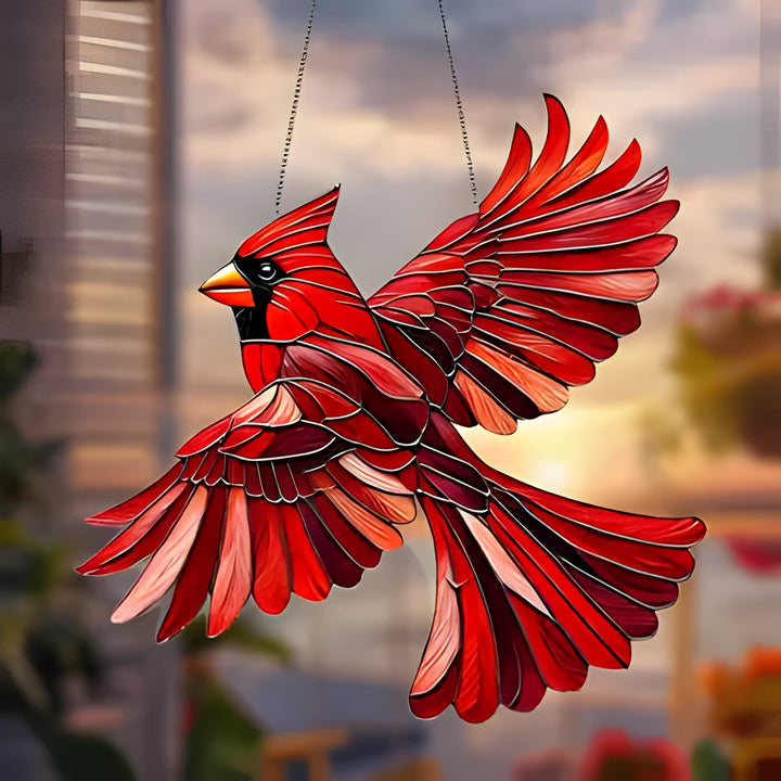 Vibrant stained glass style bird suncatcher hanging, adds a pop of color to any window decor.