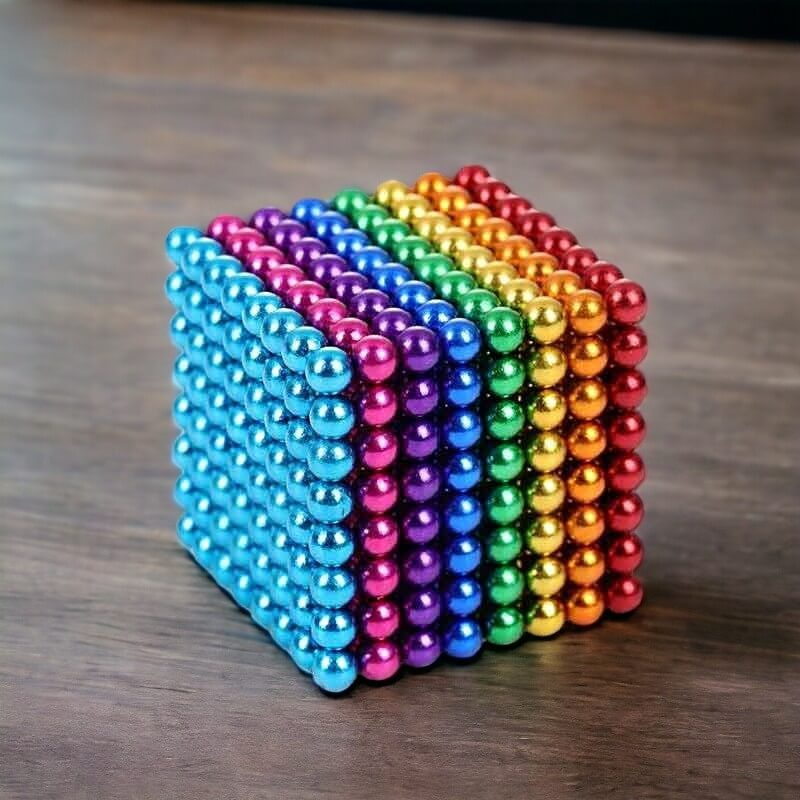 Vibrant magnetic balls set for imaginative building, sensory play & brain stimulation. Perfect educational fidget toy.
