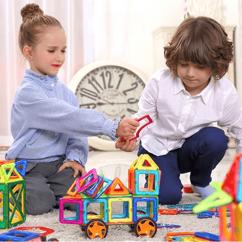 Kids' magnetic building blocks, an educational toy developing spatial reasoning & fine motor skills. Perfect for learning.
