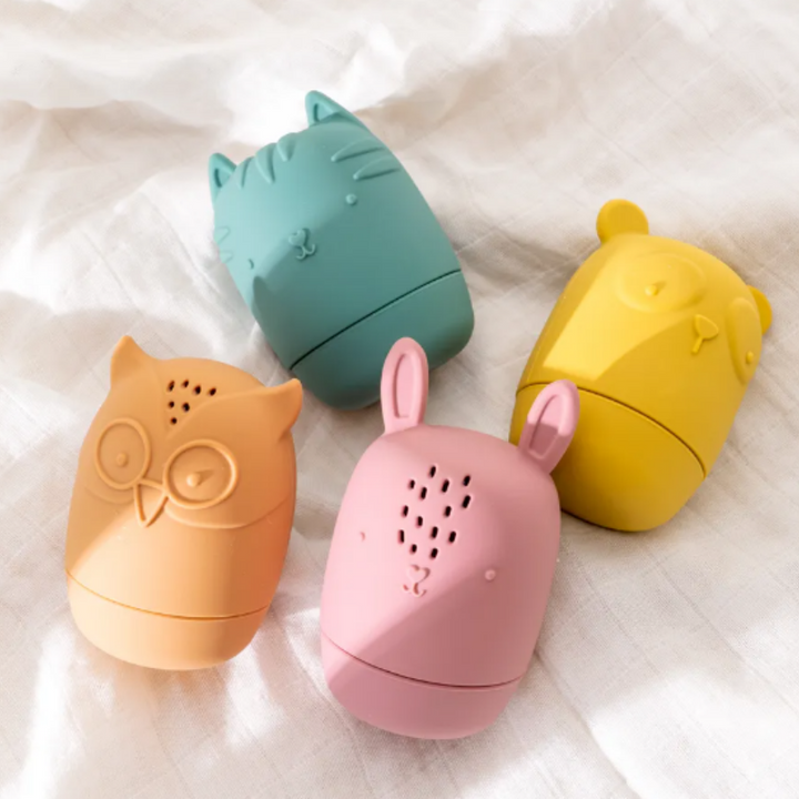 Colorful mold-free silicone bath toys for kids, featuring fun squeeze & squirt animal buddies for safe toddler water play.