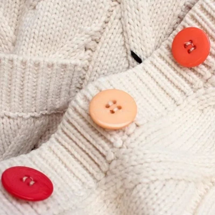 Versatile women's Patcha cardigan. Colorful, unique style ideal for fall/winter layering, adding a cozy & expressive touch.