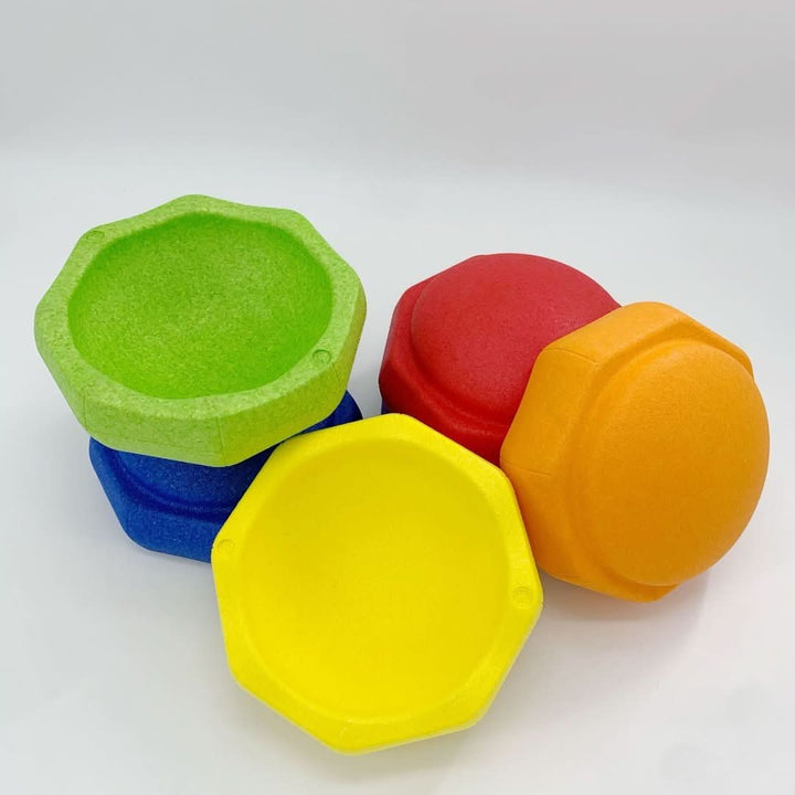 Durable stacking stones for children's indoor & outdoor creative play, promoting coordination.