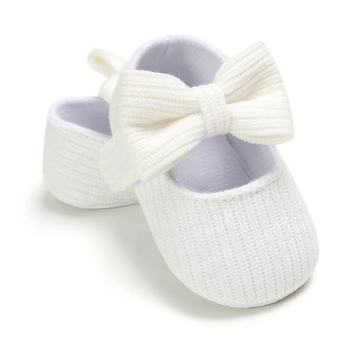 Toddler first step shoes, designed for exploration, featuring a comfortable soft sole & supportive fit.