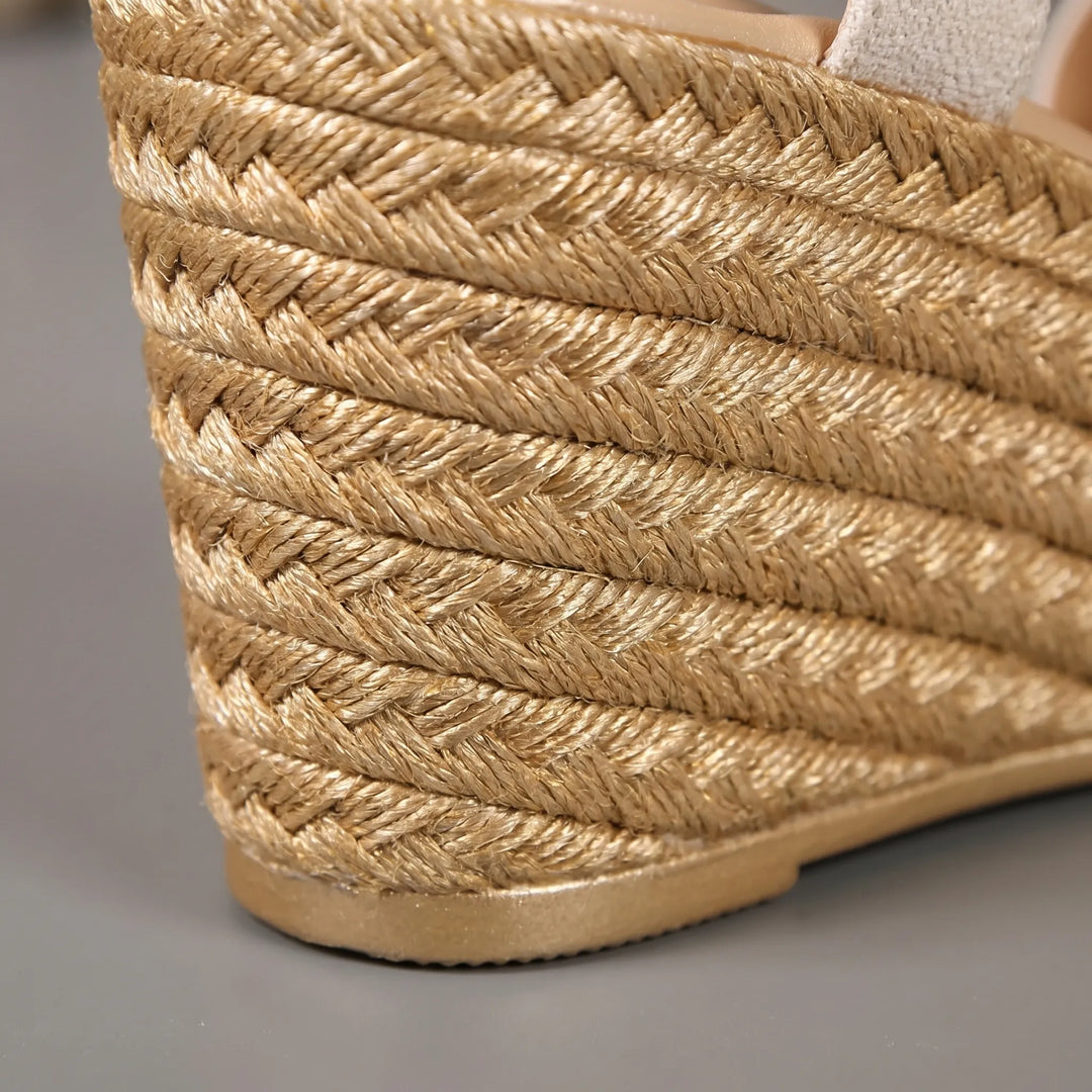 Beige open-toe platform wedge sandals for women, offering comfortable stable lift for casual or dressy occasions.