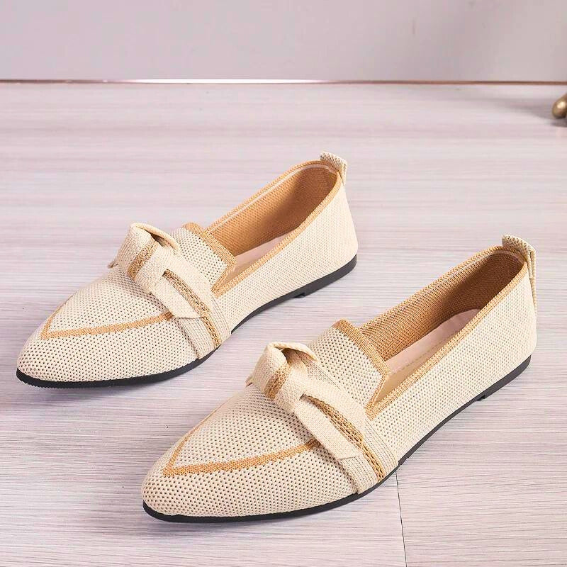 Comfortable brown Orlena ballet flats for women, featuring a twisted toe design for all-day style.
